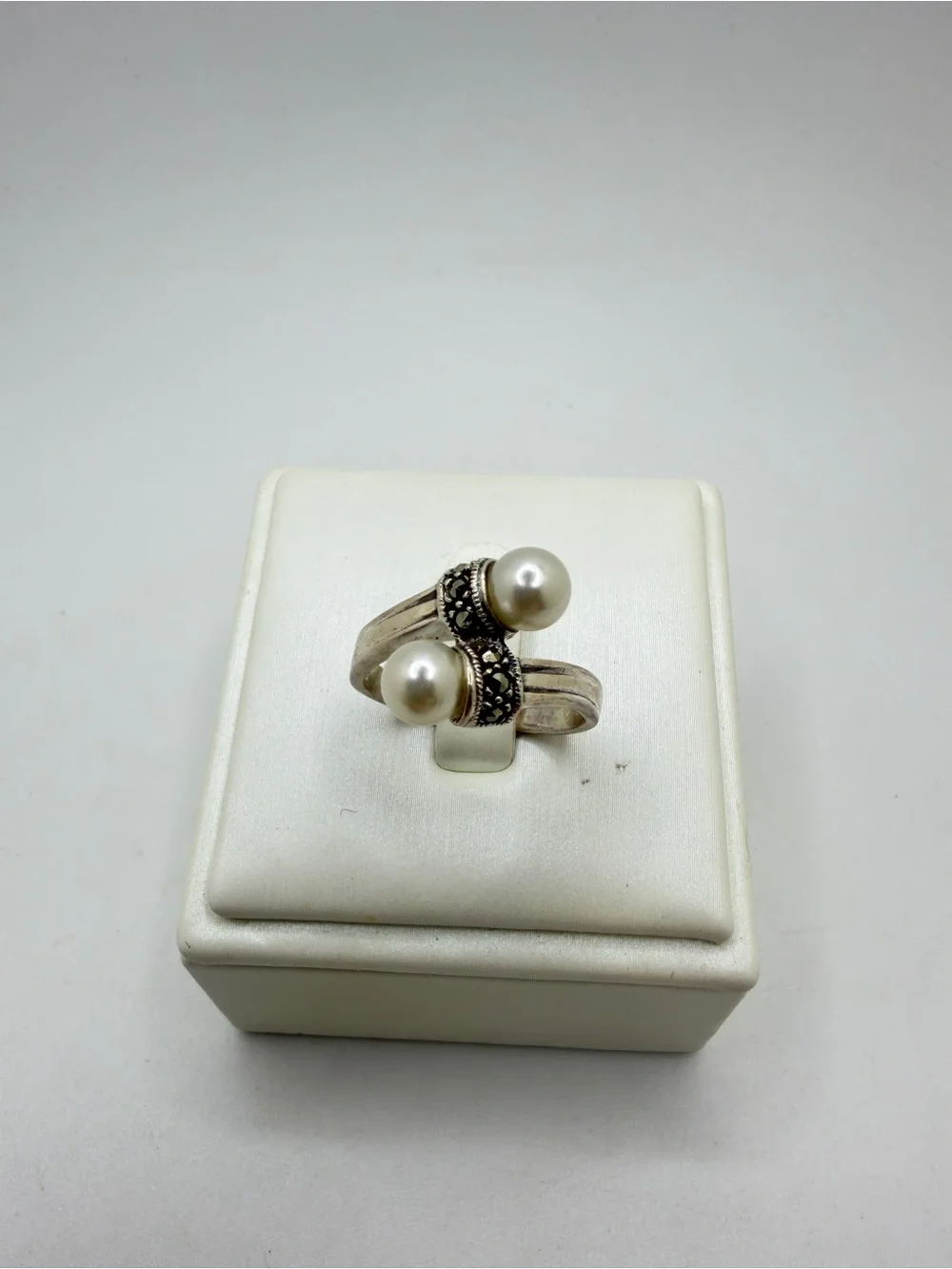 Sterling‎ silver stamped, faux pearl and marcasite bypass ring!